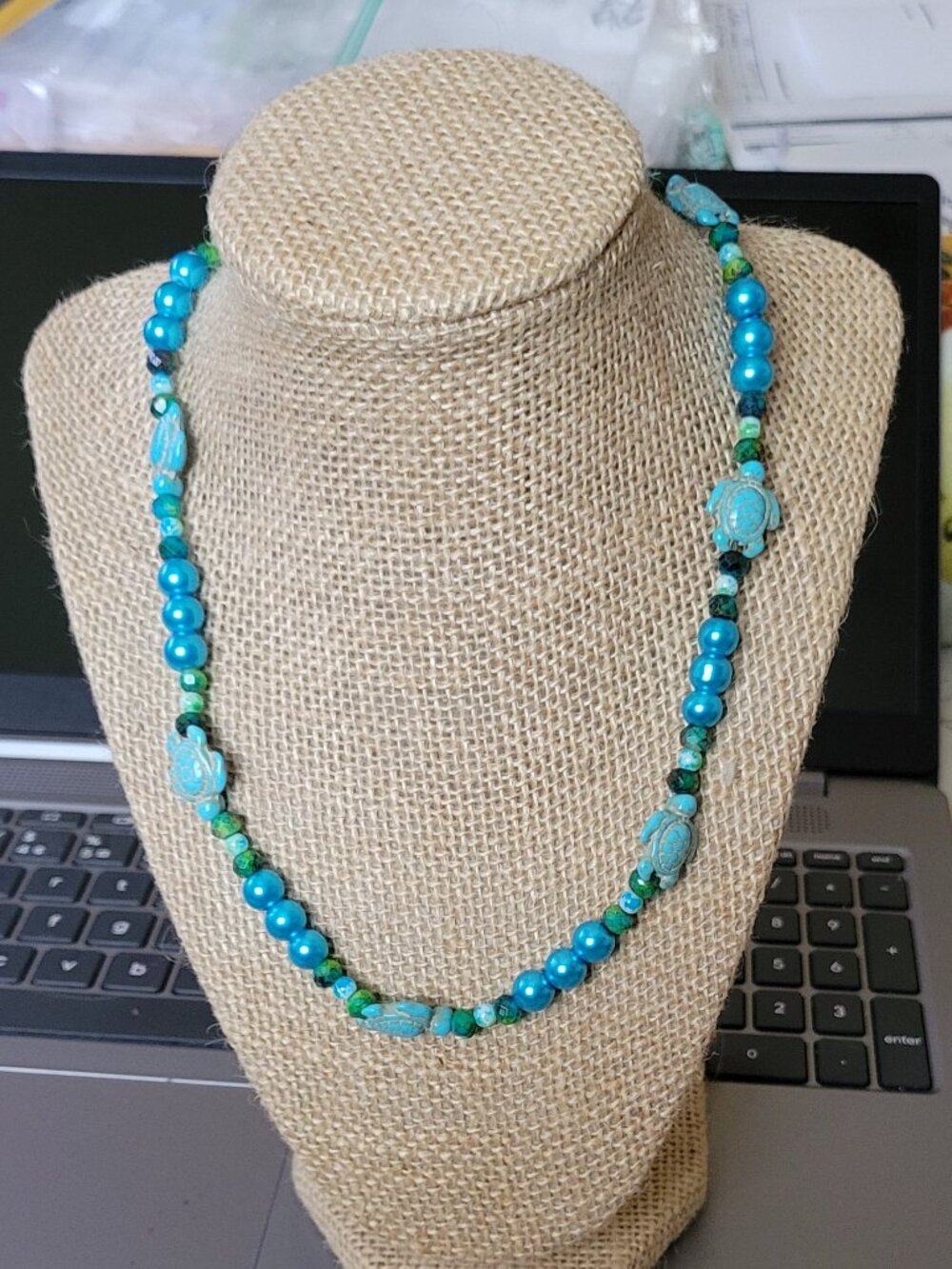 Effervescent Blue and Black Beads with Carved Turquoise Turtles Necklace